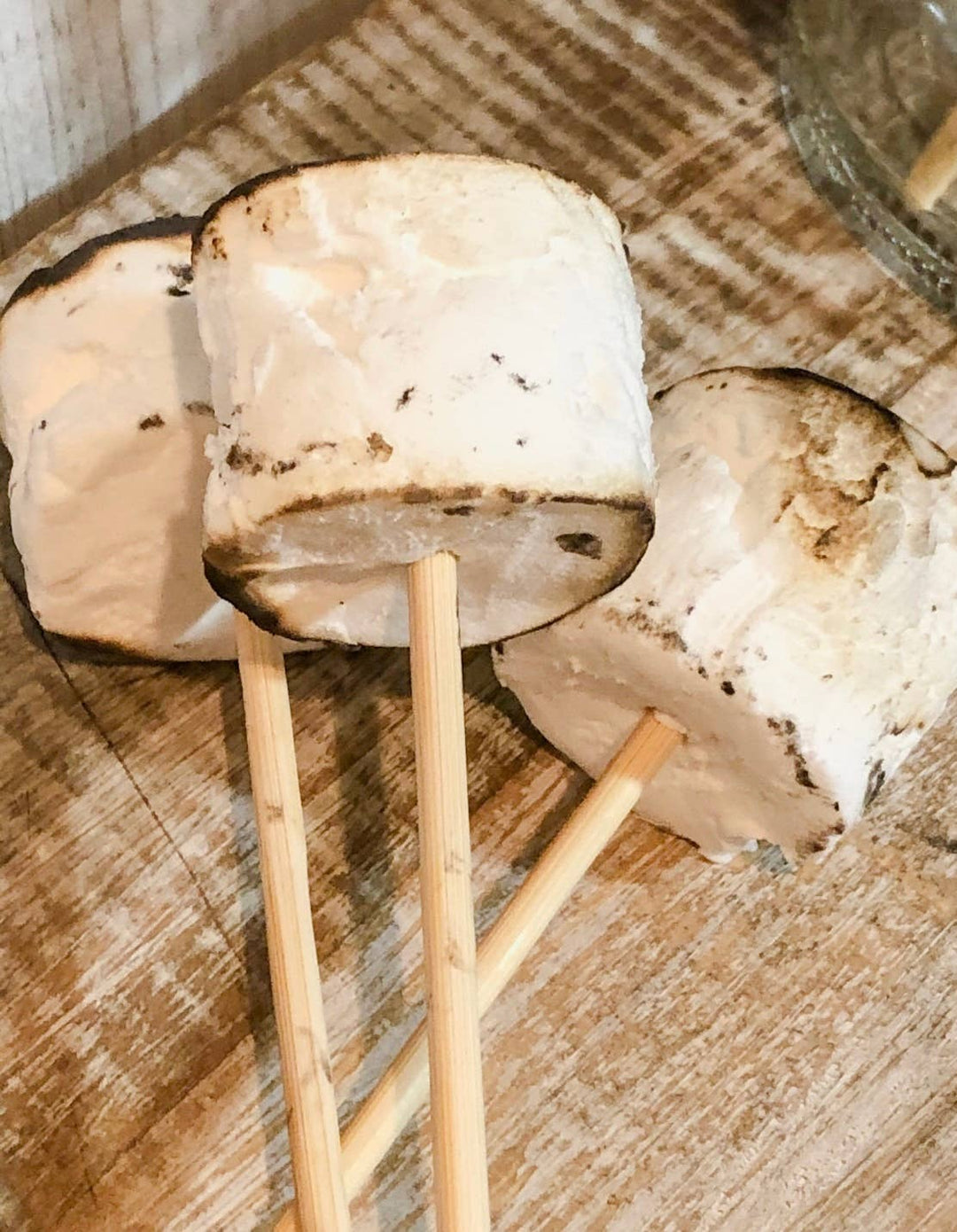 Faux Marshmallows with a skewer, toasted fake marshmallow